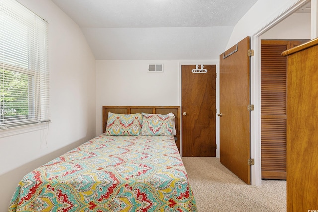 2191 Liberty Cir, Little River, SC 29566 - carpeted bedroom featuring lofted ceiling