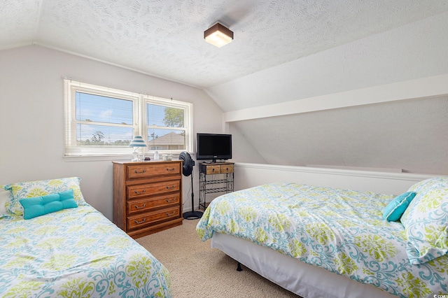 2191 Liberty Cir, Little River, SC 29566 - bedroom featuring vaulted ceiling, light colored carpet, and a textured ceiling
