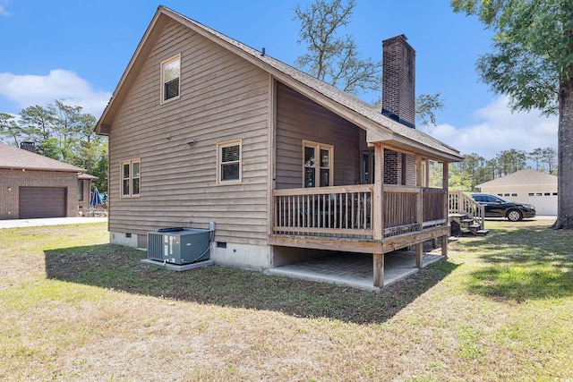 2191 Liberty Cir, Little River, SC 29566 - rear view of property with central AC unit, a chimney, crawl space, and a yard