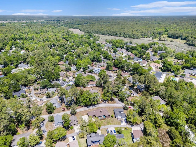 2191 Liberty Cir, Little River, SC 29566 - aerial view of property and surrounding area featuring a heavily wooded area and nearby suburban area