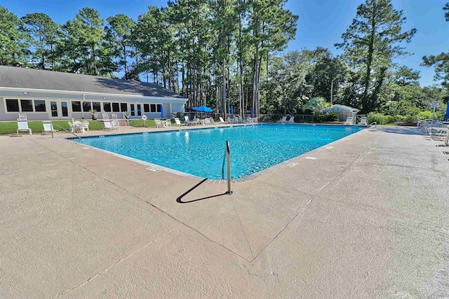 2191 Liberty Cir, Little River, SC 29566 - community pool featuring a patio