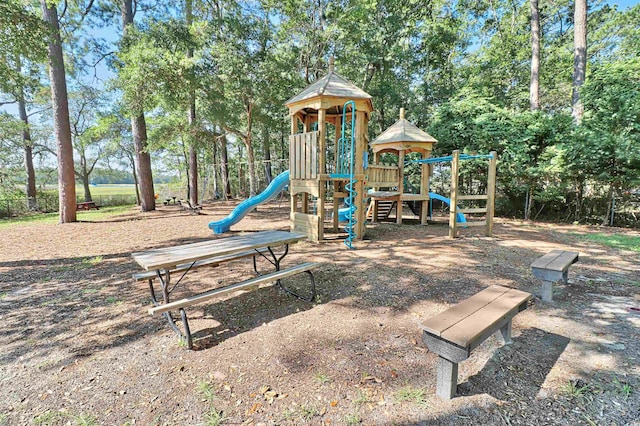 2191 Liberty Cir, Little River, SC 29566 - community jungle gym featuring view of wooded area