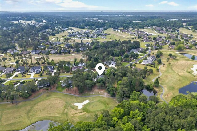 79 Windsor Cir SW, Ocean Isle Beach, NC 28469 - view of property location with a golf club, nearby suburban area, and a large body of water