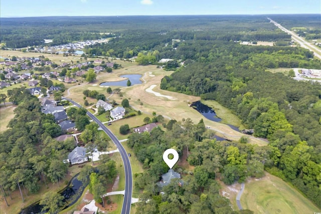 79 Windsor Cir SW, Ocean Isle Beach, NC 28469 - view of property location featuring a large body of water, a forest, and a golf club