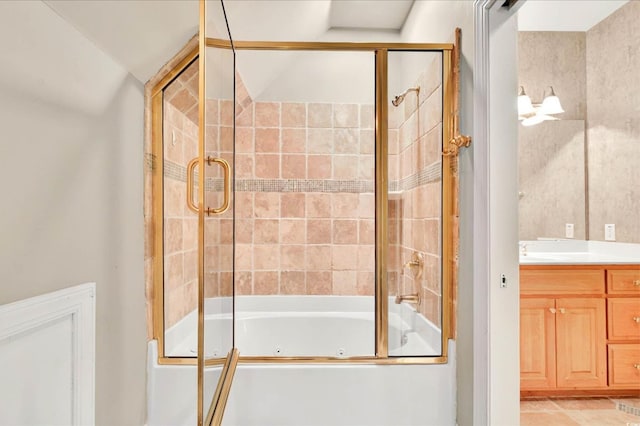 79 Windsor Cir SW, Ocean Isle Beach, NC 28469 - full bath featuring a combined bath / shower with jetted tub, vanity, and tile patterned floors