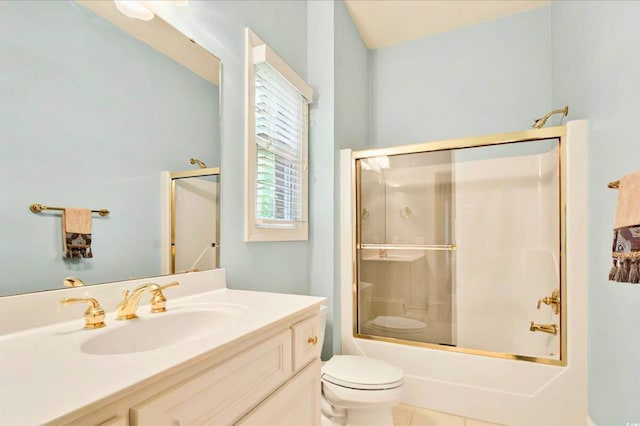 79 Windsor Cir SW, Ocean Isle Beach, NC 28469 - full bathroom with toilet, enclosed tub / shower combo, vanity, and tile patterned flooring