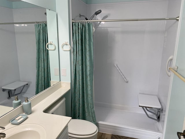 5001 Little River Rd Unit E-306, Myrtle Beach, SC 29577 - full bathroom with curtained shower, toilet, and vanity