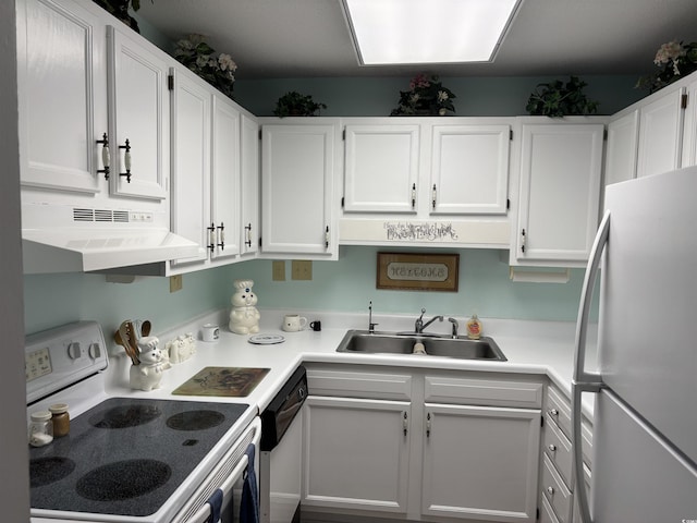 5001 Little River Rd Unit E-306, Myrtle Beach, SC 29577 - kitchen featuring white appliances, a sink, under cabinet range hood, and white cabinets