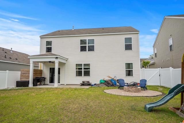 5068 Wavering Place Loop, Myrtle Beach, SC 29579 - back of property featuring a patio area, ceiling fan, an outdoor fire pit, and roof with shingles