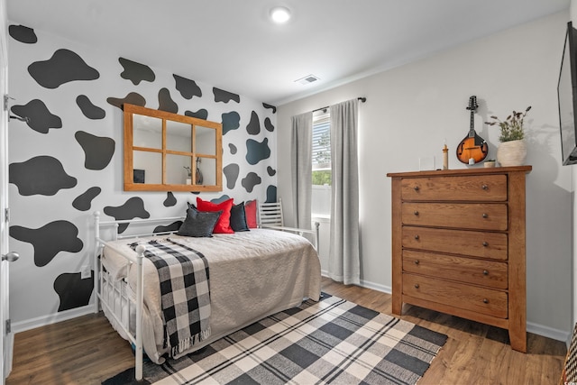 5068 Wavering Place Loop, Myrtle Beach, SC 29579 - bedroom featuring wood finished floors, baseboards, and wallpapered walls