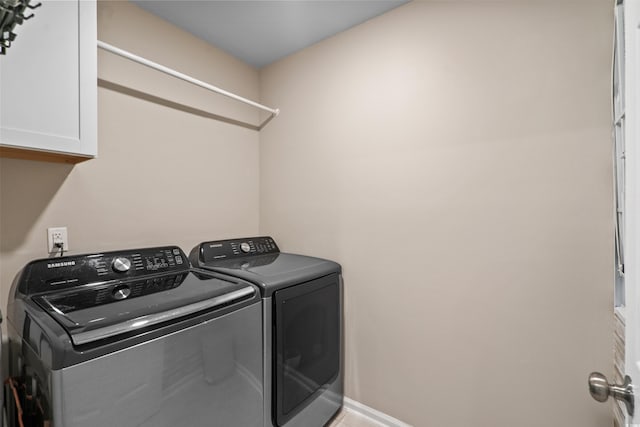 5068 Wavering Place Loop, Myrtle Beach, SC 29579 - clothes washing area with independent washer and dryer and cabinet space