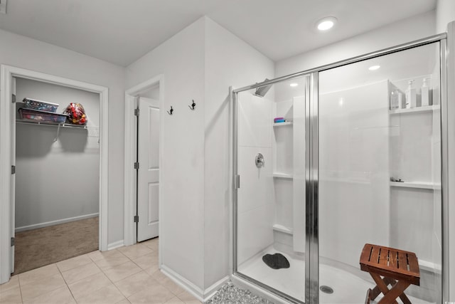 5068 Wavering Place Loop, Myrtle Beach, SC 29579 - full bath with a spacious closet, a stall shower, tile patterned floors, baseboards, and recessed lighting
