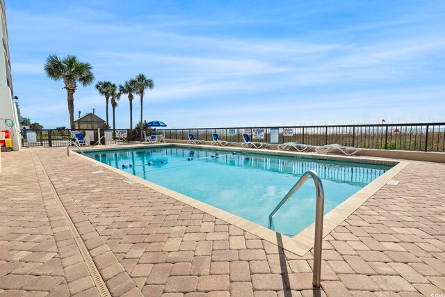 2511 S Ocean Blvd S Unit 1802B, Myrtle Beach, SC 29577 - community pool with a patio area