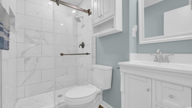 9501 Shore Dr Unit A-211, Myrtle Beach, SC 29572 - bathroom featuring toilet, vanity, and a tile shower