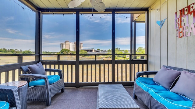 9501 Shore Dr Unit A-211, Myrtle Beach, SC 29572 - sunroom featuring healthy amount of natural light, ceiling fan, and an outdoor living space