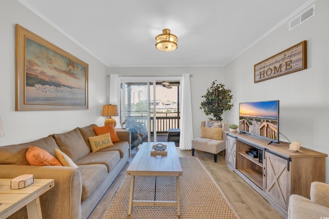 9501 Shore Dr Unit A-211, Myrtle Beach, SC 29572 - living area featuring light wood-style flooring and ornamental molding