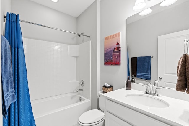 bathroom with shower / tub combo, vanity, and toilet