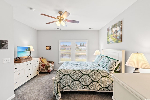 bedroom featuring carpet, ceiling fan, and baseboards