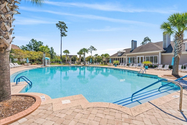 community pool featuring a patio