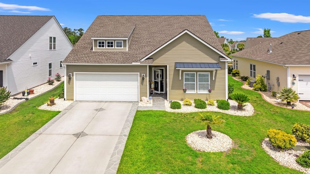 traditional home with a garage, a front lawn, a shingled roof, and driveway
