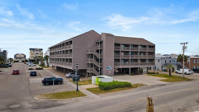 view of property with uncovered parking