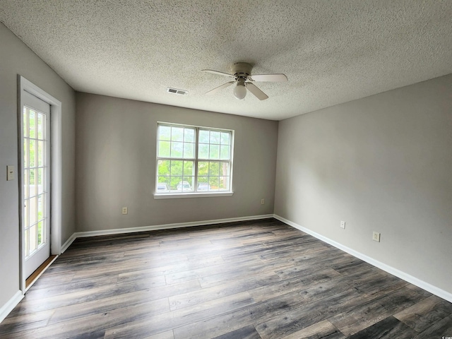 3786 Hitchcock Way Unit 321, Myrtle Beach, SC 29577 - spare room with a ceiling fan, dark wood-style flooring, a textured ceiling, and baseboards