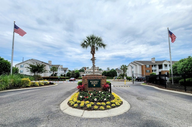 3786 Hitchcock Way Unit 321, Myrtle Beach, SC 29577 - view of asphalt road with a residential view, curbs, and a gated entry
