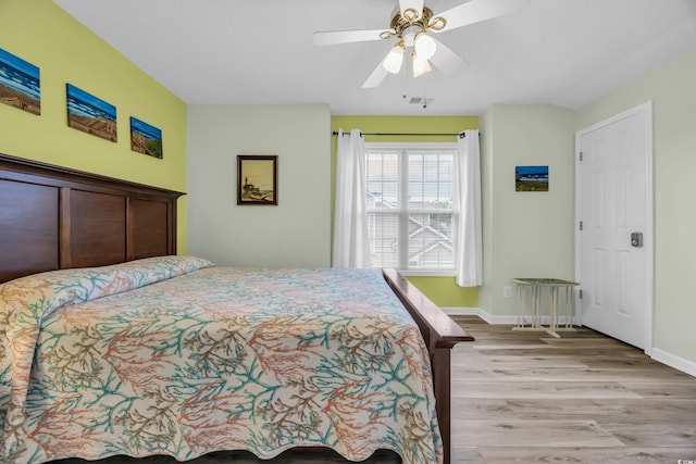 503 20th Ave N Unit 46B, North Myrtle Beach, SC 29582 - bedroom with light wood-type flooring, baseboards, and a ceiling fan