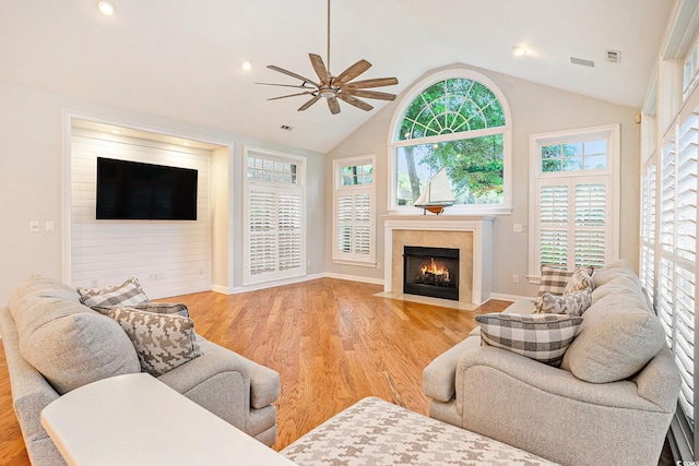 78 Oakmont Dr, Pawleys Island, SC 29585 - living room with ceiling fan, a fireplace with flush hearth, wood finished floors, high vaulted ceiling, and recessed lighting