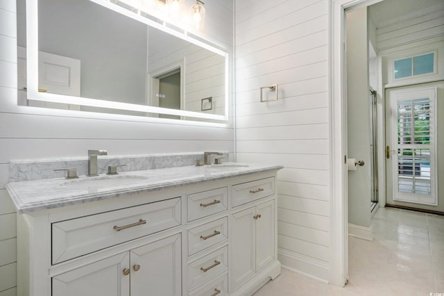 78 Oakmont Dr, Pawleys Island, SC 29585 - bathroom featuring double vanity, tile patterned floors, and baseboards