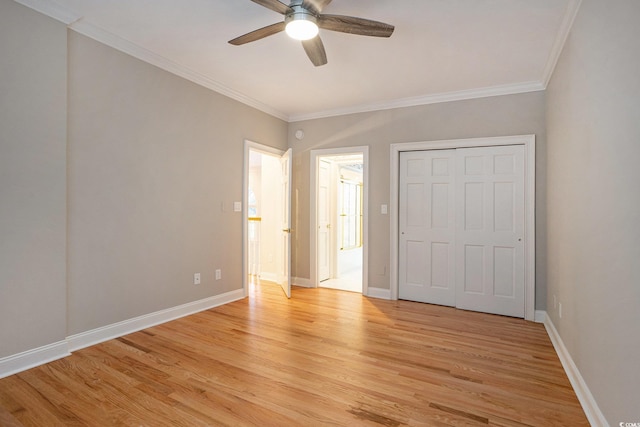 78 Oakmont Dr, Pawleys Island, SC 29585 - unfurnished bedroom featuring light wood finished floors, crown molding, and baseboards