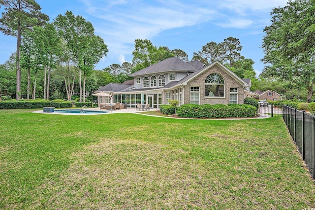 78 Oakmont Dr, Pawleys Island, SC 29585 - back of property featuring brick siding, a patio area, and an outdoor hangout area