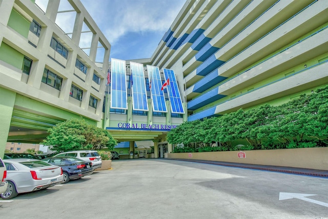 1105 S Ocean Blvd Unit 1144, Myrtle Beach, SC 29577 - view of building exterior with uncovered parking