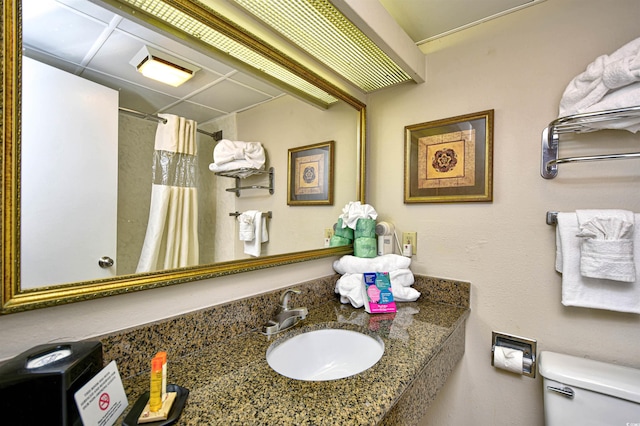 1105 S Ocean Blvd Unit 1144, Myrtle Beach, SC 29577 - full bathroom featuring toilet, a shower with curtain, and vanity