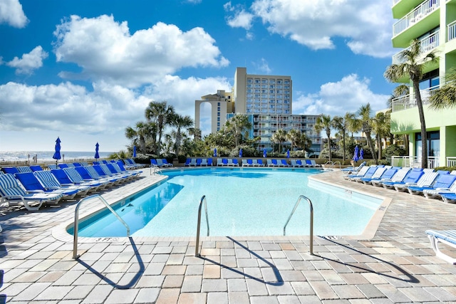 1105 S Ocean Blvd Unit 1144, Myrtle Beach, SC 29577 - community pool featuring a patio area