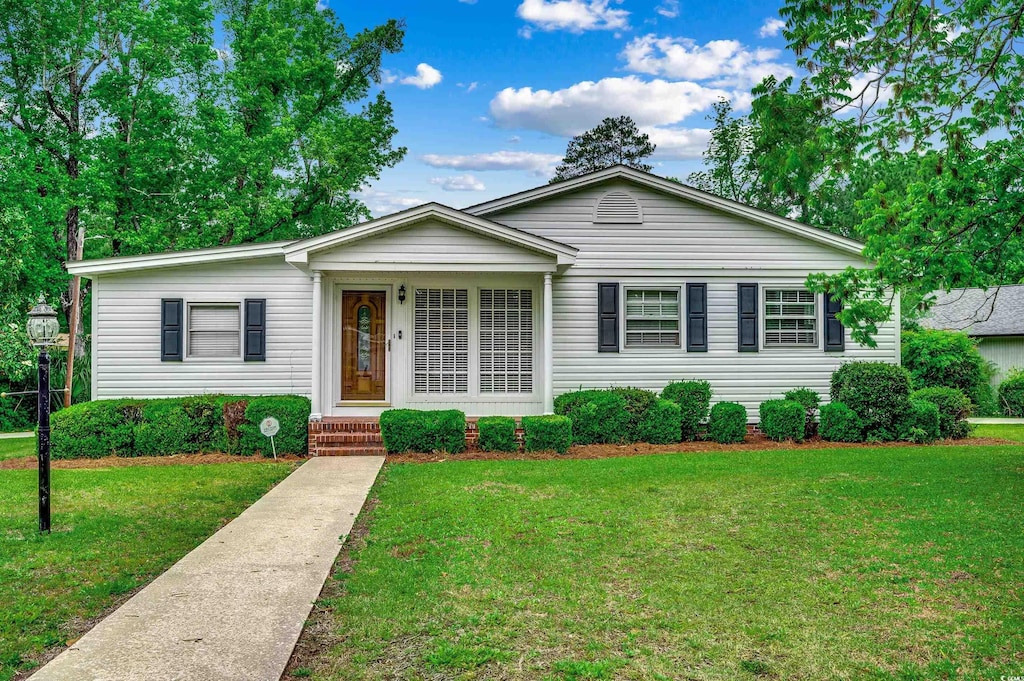 1261 Parkhill Dr, Conway, SC 29526 - view of front facade featuring a front lawn