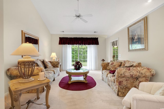 living room featuring carpet floors and ceiling fan
