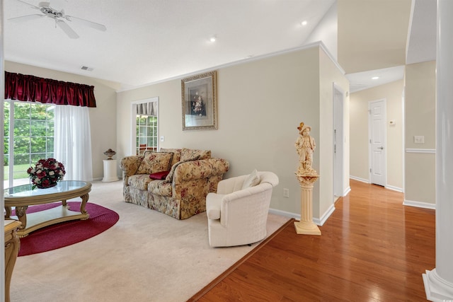 living area featuring a ceiling fan, wood finished floors, recessed lighting, and baseboards