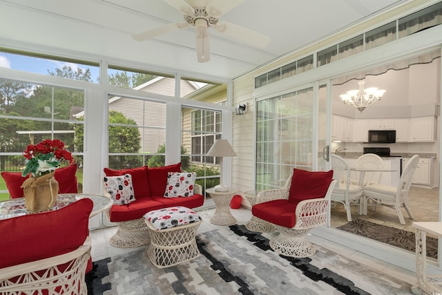 sunroom featuring a chandelier