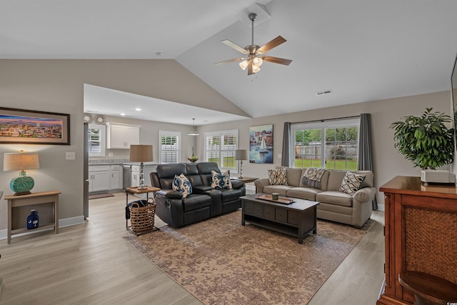 1307 Collins Park St, Conway, SC 29526 - living area with light wood-style floors, lofted ceiling, a ceiling fan, baseboards, and recessed lighting