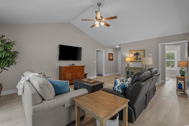 1307 Collins Park St, Conway, SC 29526 - living room featuring a ceiling fan, light wood-style floors, high vaulted ceiling, and baseboards