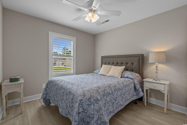 1307 Collins Park St, Conway, SC 29526 - bedroom with light wood finished floors, baseboards, and ceiling fan