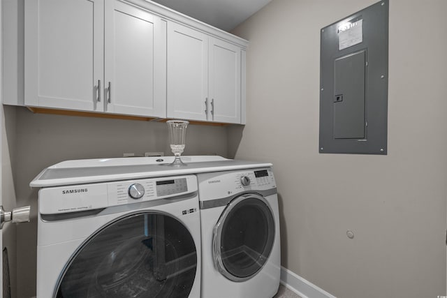 1307 Collins Park St, Conway, SC 29526 - clothes washing area with washing machine and dryer, cabinet space, electric panel, and baseboards