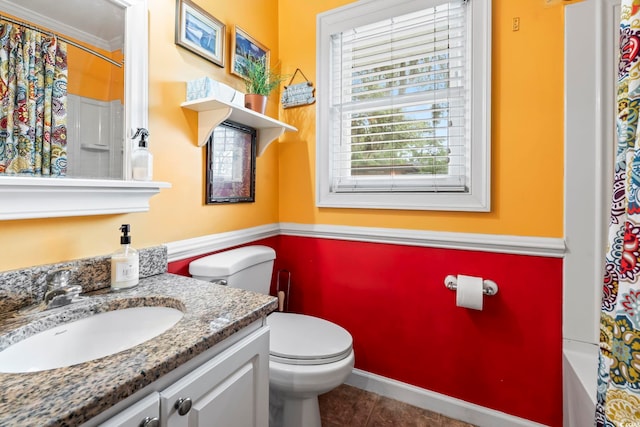 full bathroom with toilet, tile patterned flooring, and vanity