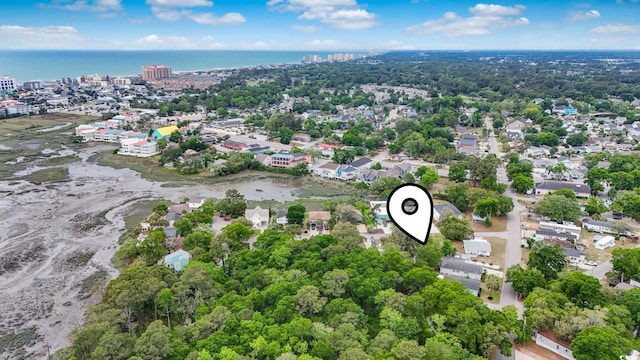view of urban area with a nearby body of water