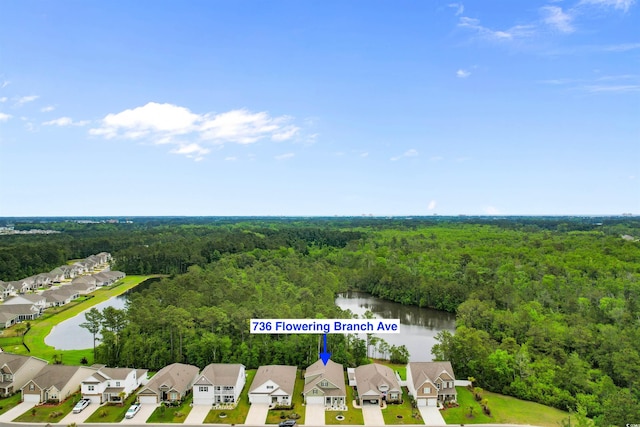 736 Flowering Branch Ave, Little River, SC 29566 - aerial perspective of suburban area featuring a forest and a large body of water