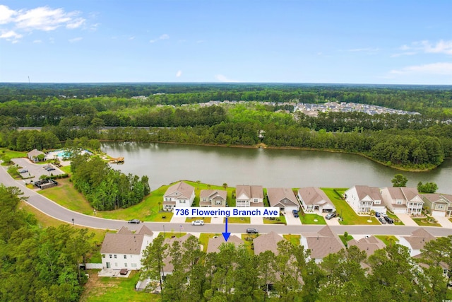 736 Flowering Branch Ave, Little River, SC 29566 - aerial view of residential area featuring a large body of water and a heavily wooded area