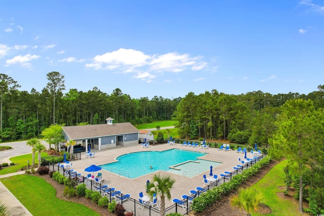 736 Flowering Branch Ave, Little River, SC 29566 - community pool with a patio area and a forest view