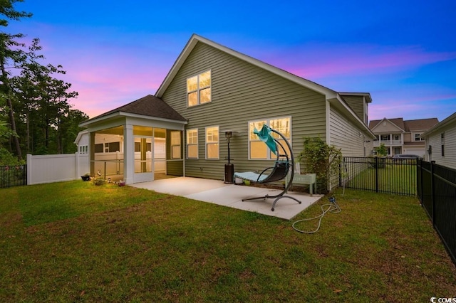 736 Flowering Branch Ave, Little River, SC 29566 - back of house with a patio area, a fenced backyard, and a sunroom