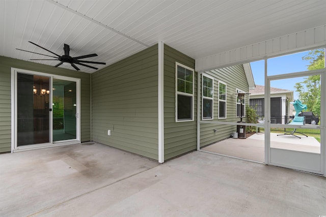 736 Flowering Branch Ave, Little River, SC 29566 - unfurnished sunroom with a ceiling fan